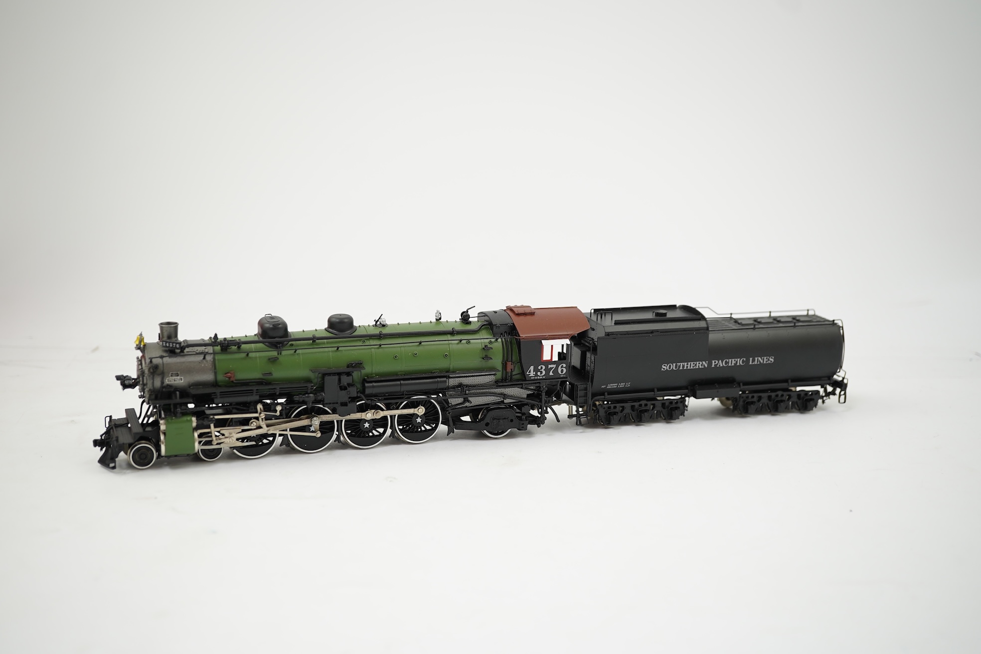 A boxed HO gauge Key Imports model of Southern Pacific Lines MT-5, 4376, 4-8-2 tender locomotive, powered for two rail operation.